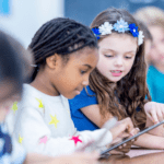 Coding Activities girls coding on tablets